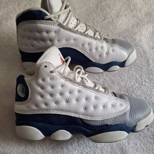 White and Blue Jordans Athletic Sneakers